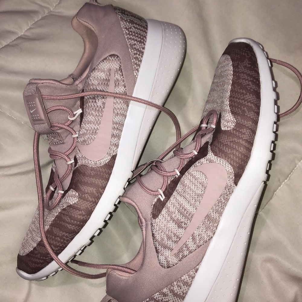 Nike mauve running shoes